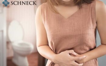 Woman holding her stomach