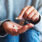 Person holding pills in his hand