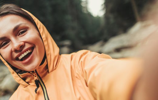 Young active woman smiling in the outdoors