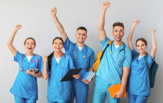 photo of student doctors cheering