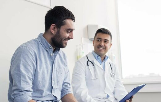 A doctor informs a patient about colonoscopies