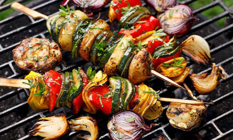 photo of kebabs on grill