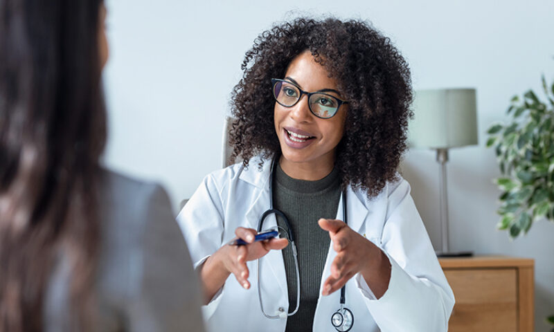 Doctor talking to patient