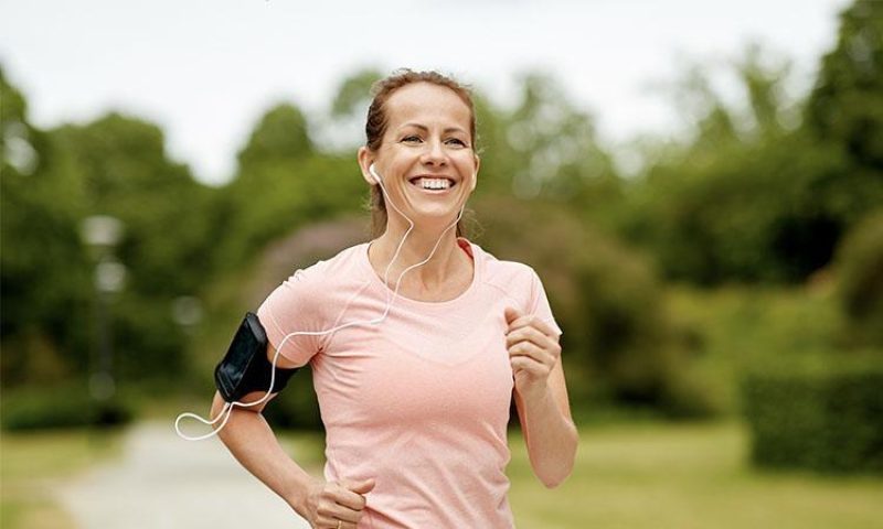 Woman on a run in the park/on a trail