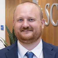 headshot of Samuel Brinson, DO