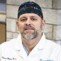 headshot of G. Brandon Millick, MD