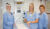 Nurses standing near medical equipment