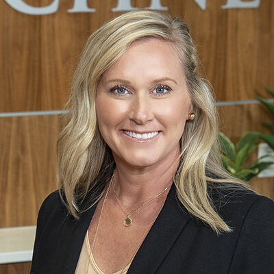 Close up photo of Susan Zabor, Schneck Vice President of Clinical Services.  She is smiling, has blonde hair, and is wearing a black jacket.