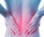 photo of person holding their lower back that has red and blue color radiating from painful areas