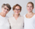 3 generations of women smiling in a warm embrace