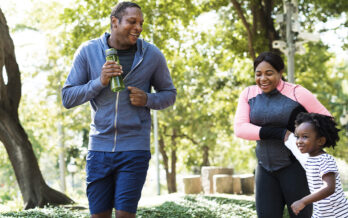 Family outside on a jog