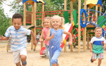 Kids running at a playground