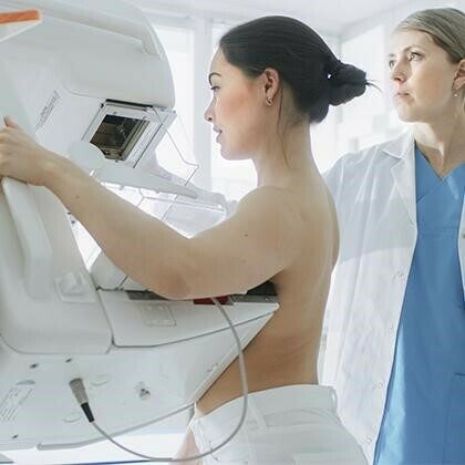 Patient receiving a mammogram