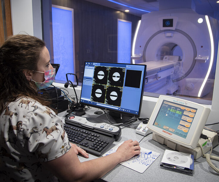 Woman performing a MRI Screening