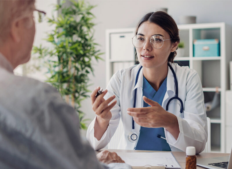 A doctor explains a procedure to a patient.
