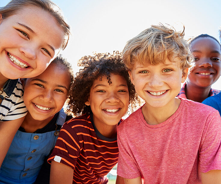 group of children smiling at camera