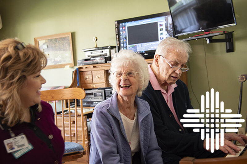 Older couple laughing at the doctor
